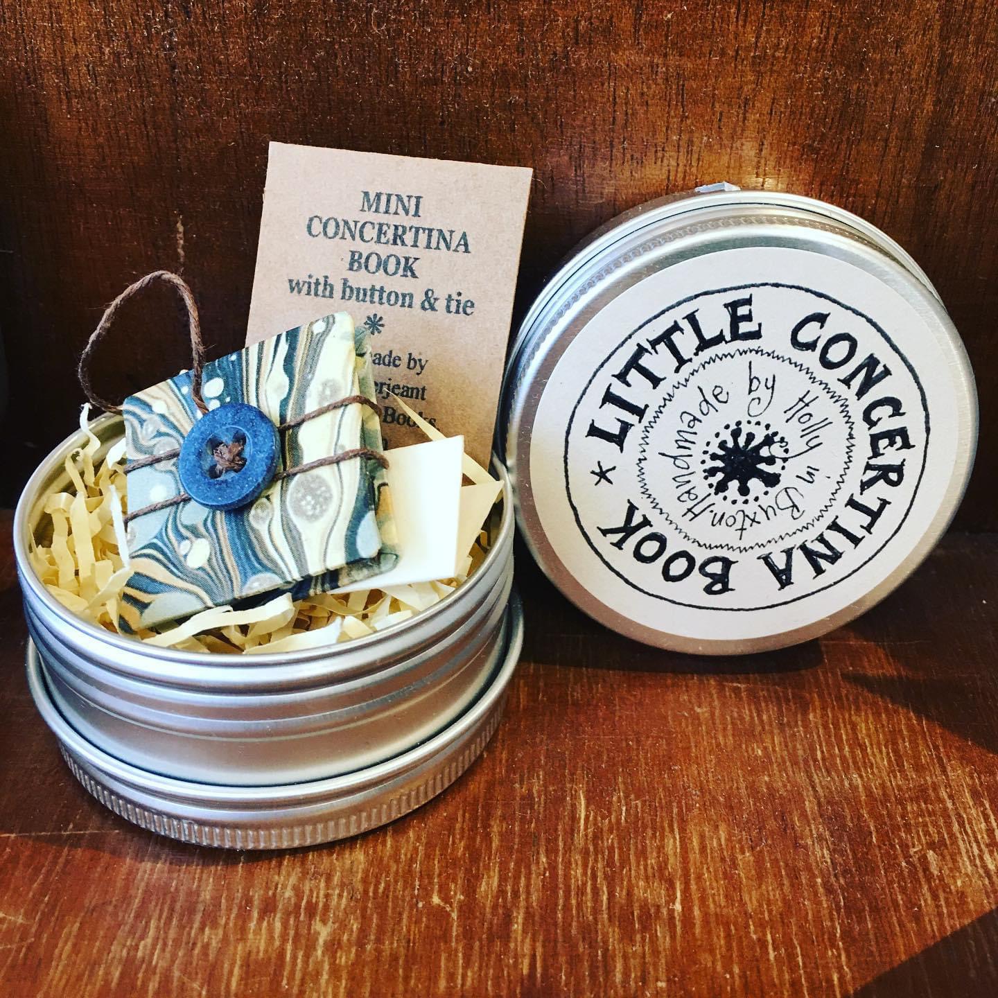 Mini_concertina_in_tin.JPG